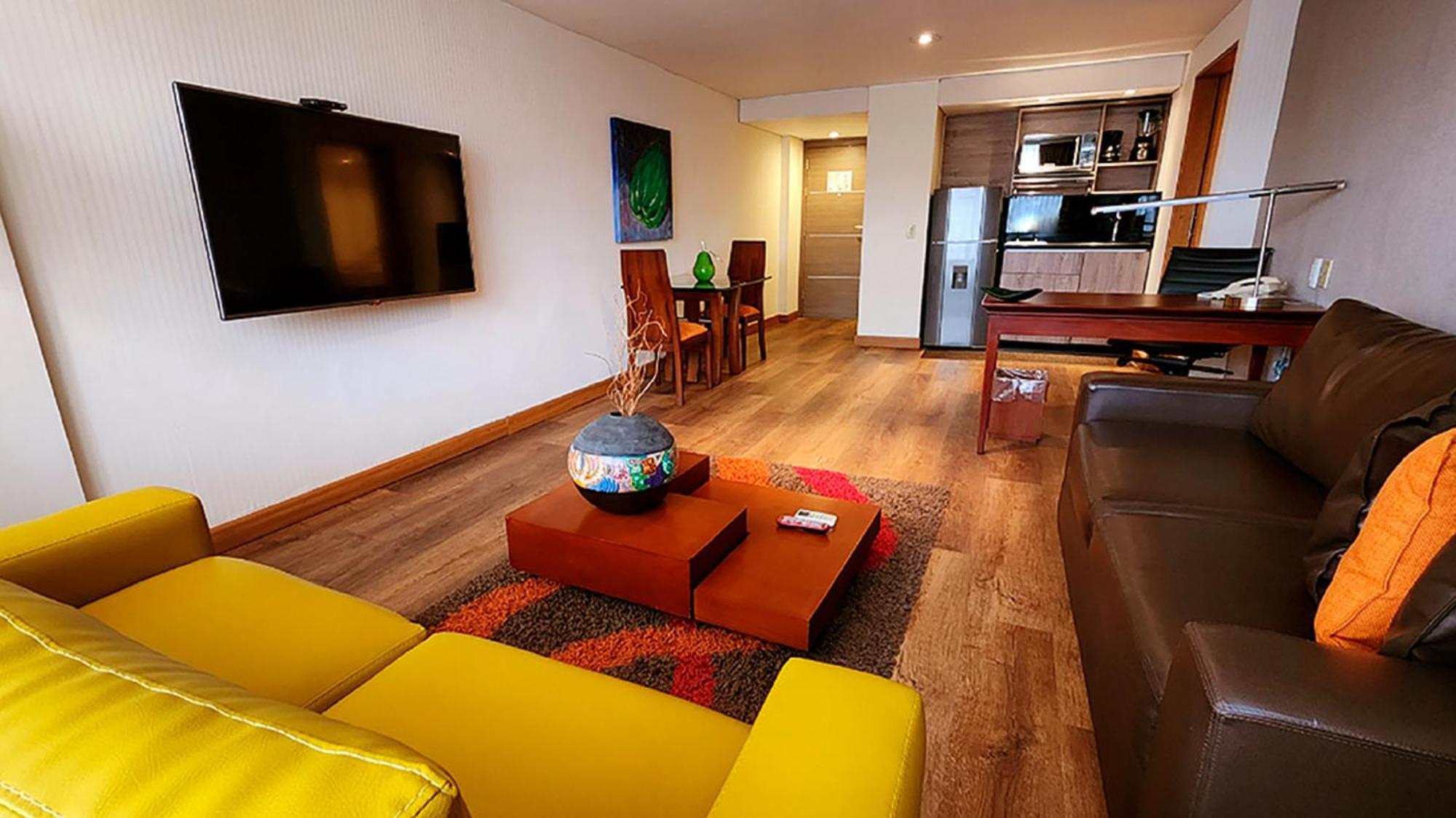 Bogota Plaza Hotel エクステリア 写真 A living room in a serviced apartment in Lima, Peru